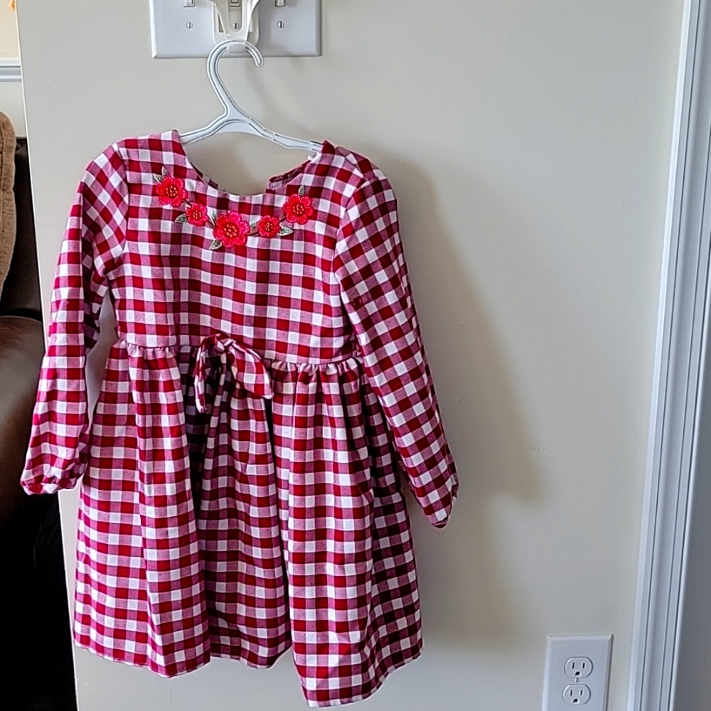A maroon and white dress